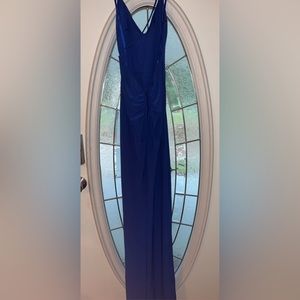 This is a royal blue prom dress in good condition